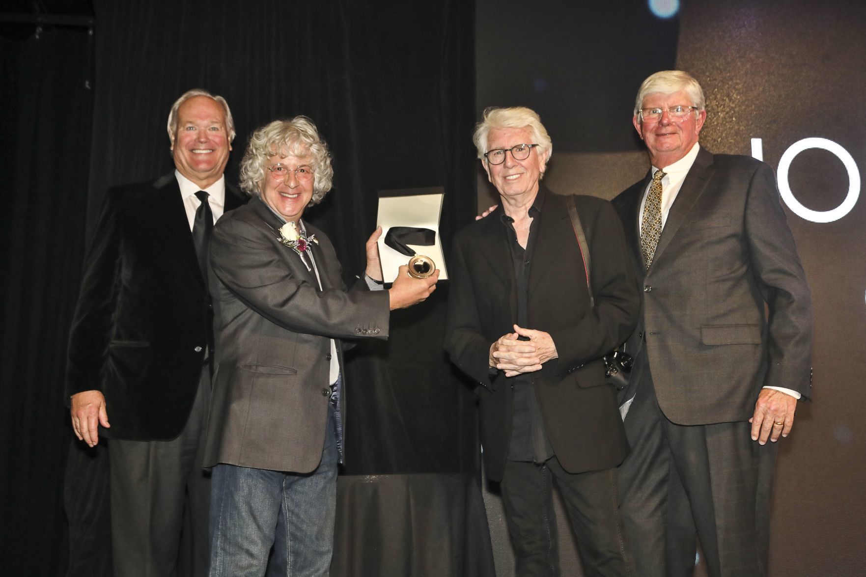 Dick Miles, Chairman of the Board, Joel Bernstein, honoree, Graham Nash, Bob Bishop, chair of induction committee and board member